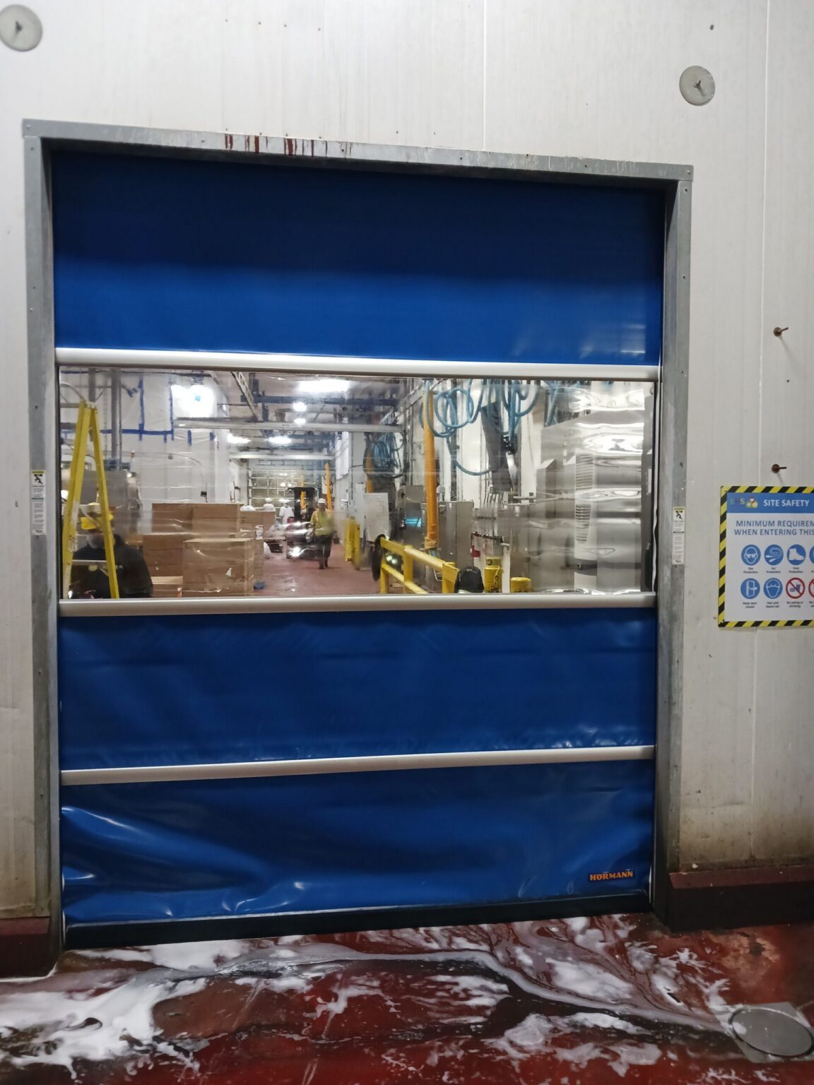 Hormann hygienic high-speed door installed by Wilcox at a Mississauga food processing facility