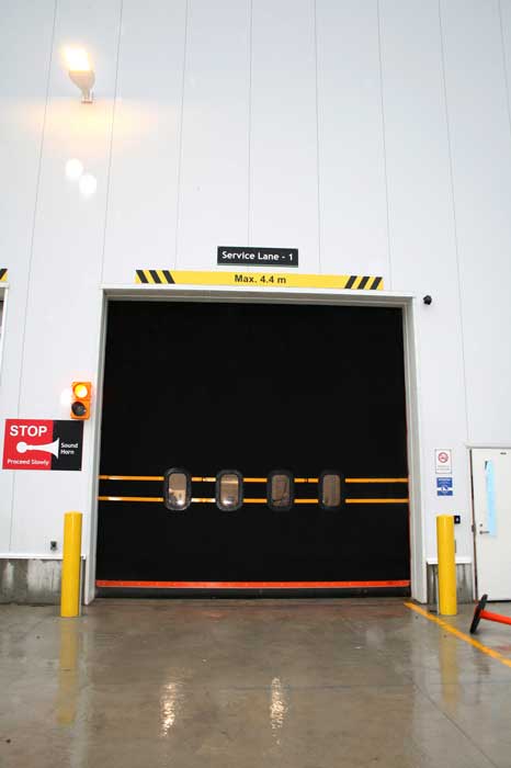 Large warehouse rubber door air barrier outside view