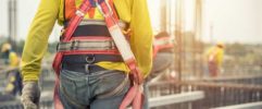 Construction worker wearing a harness