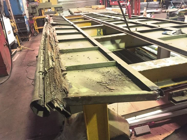 Historic Multi-Plex Door Repair — 1962 Door System Restoration, Ontario