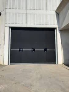 High-Performance Rubber Door Upgrade — High-Volume Equipment Repair Facility